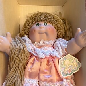Cabbage Patch Kids Blonde Yarn Hair Doll in Pink Dress